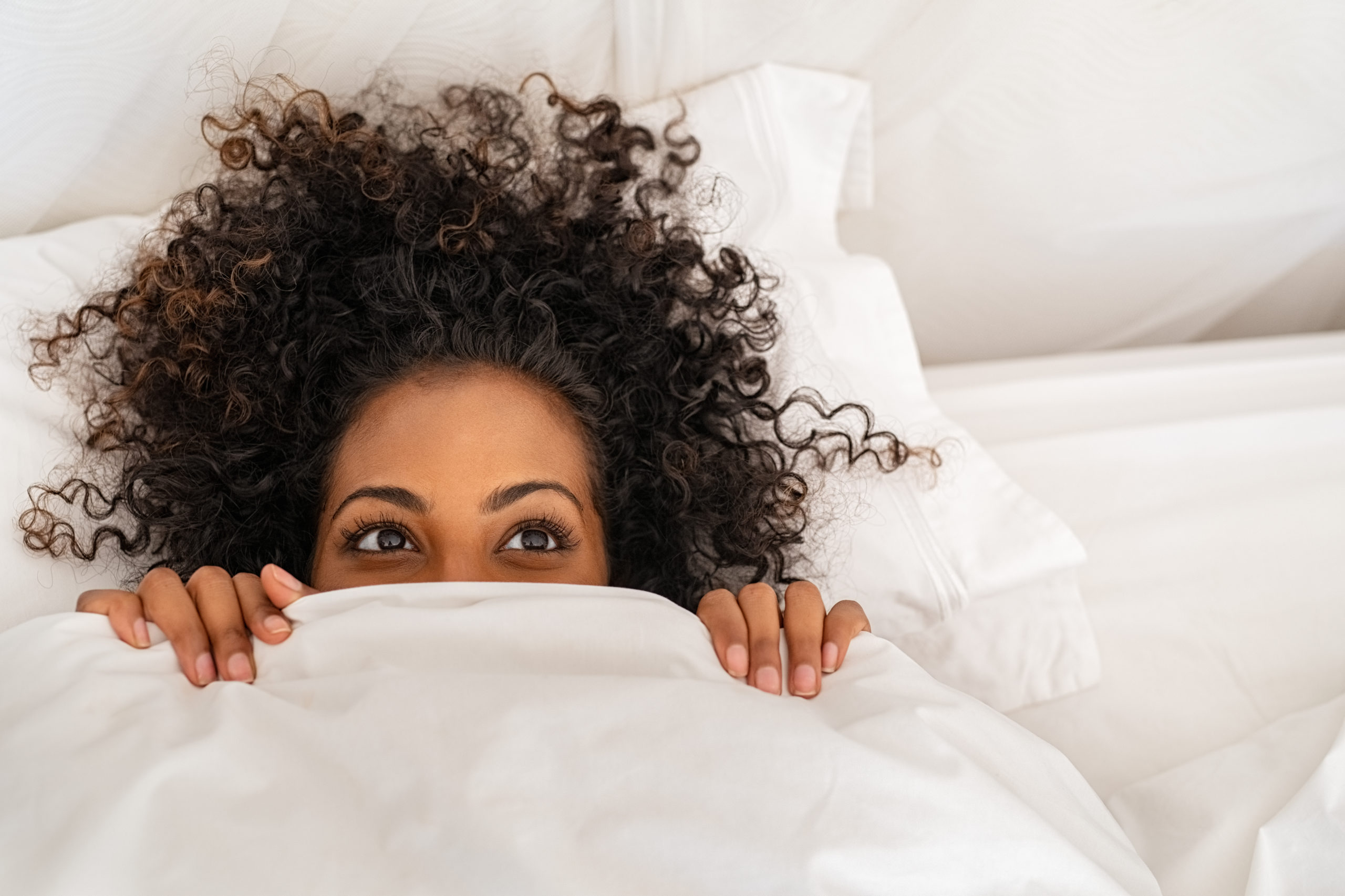 What Are the Benefits of Sleeping Naked? SleepScore photo