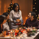 Group eating a holiday meal at the table